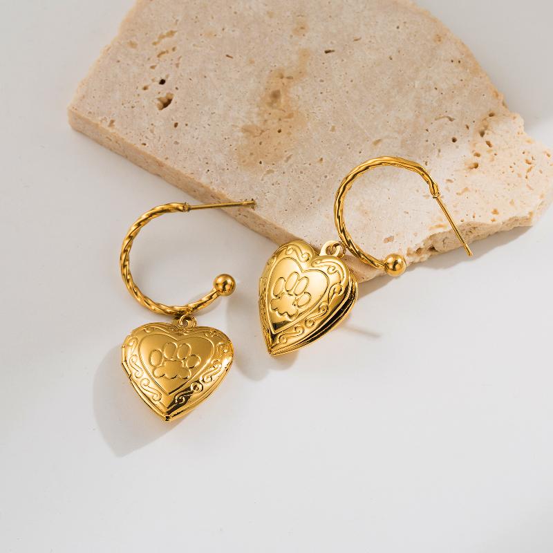 Aretes corazones relieve y calados chapa Oro18K