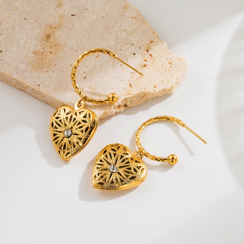 Aretes corazones relieve y calados chapa Oro18K