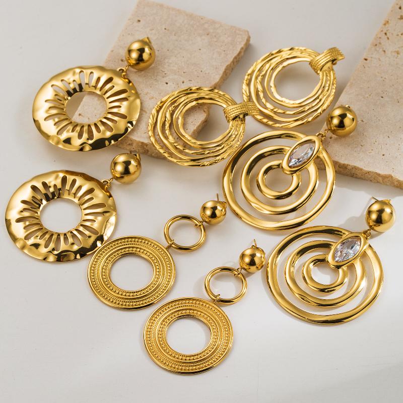 Aretes de moda aros de chapa de Oro18K con incrustaciones