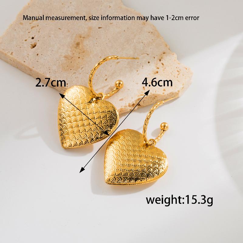 Aretes corazones relieve y calados chapa Oro18K