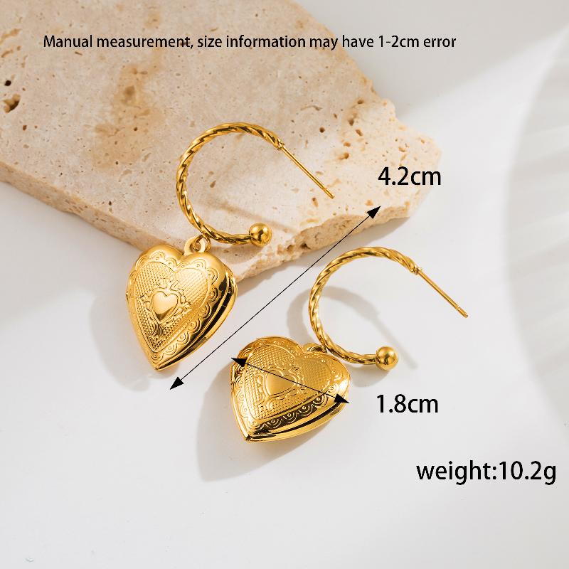 Aretes corazones relieve y calados chapa Oro18K