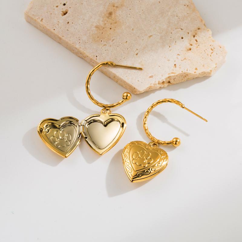 Aretes corazones relieve y calados chapa Oro18K