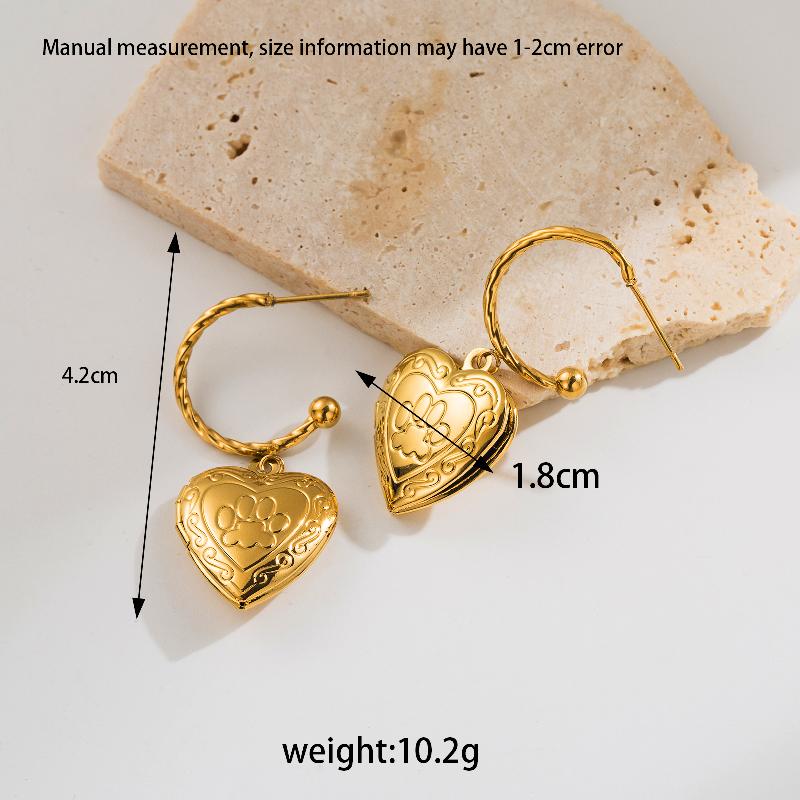 Aretes corazones relieve y calados chapa Oro18K