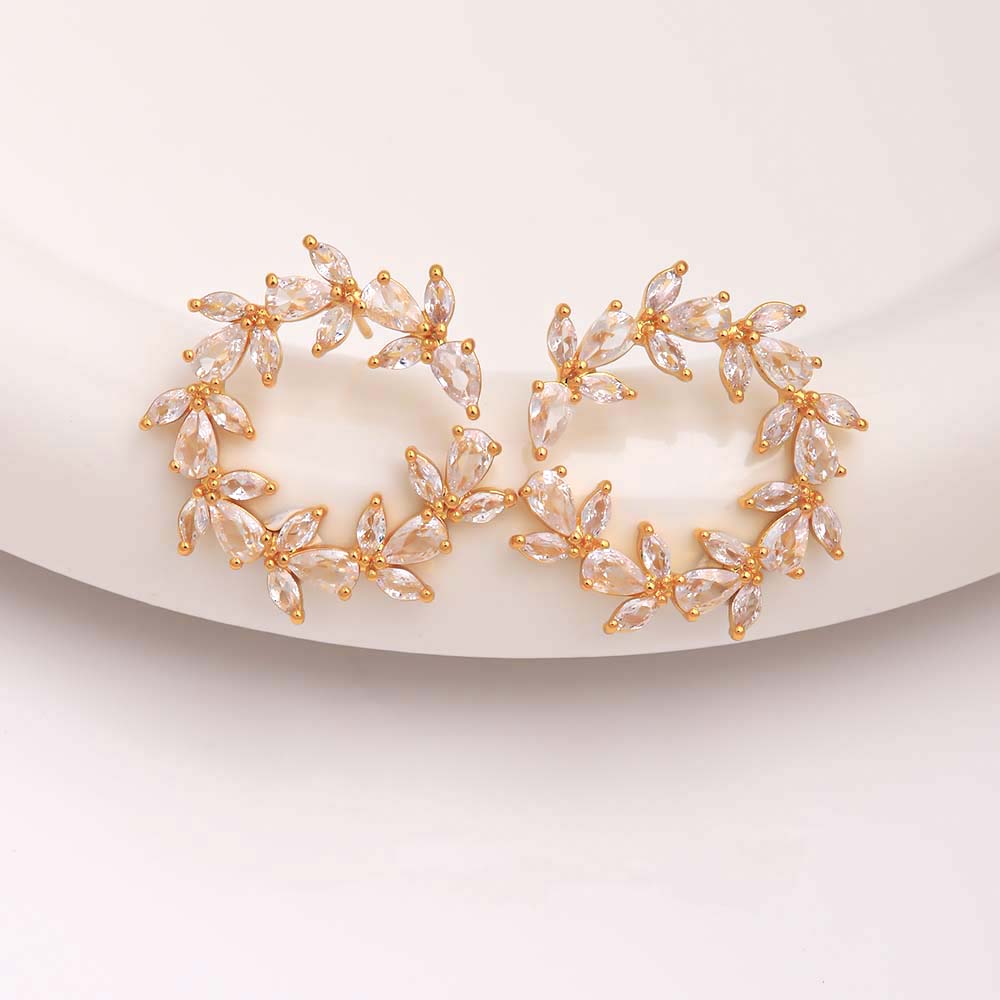 Aretes con incrustación de brillantes chapa de Oro18K