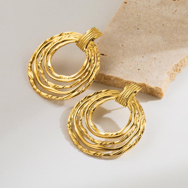 Aretes de moda aros de chapa de Oro18K con incrustaciones