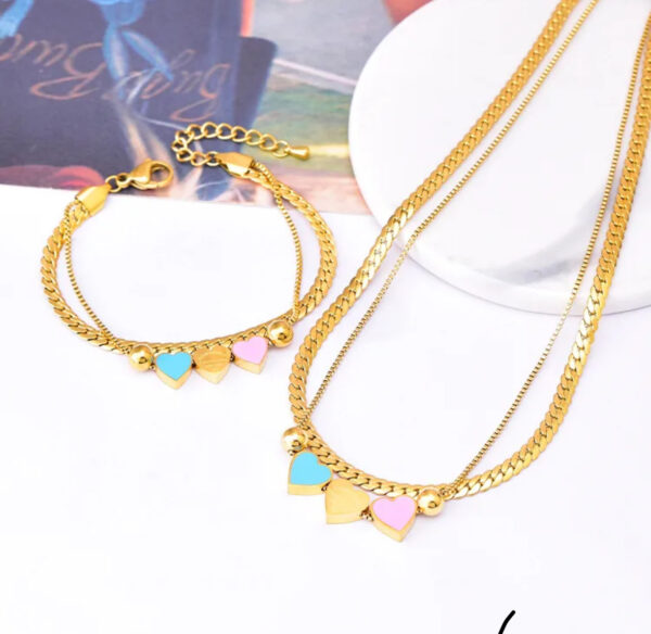 Set de joyas collar y pulsera corazones acero inoxidable.