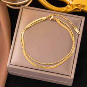 Pulsera doble panza de víbora y granos de arroz acero inoxidable.